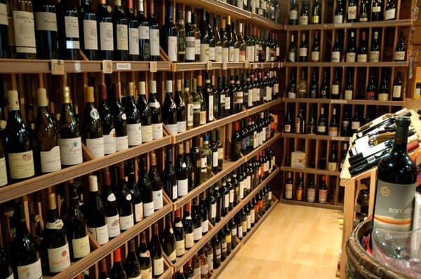The wall of bottles inside The Clown after the wine and spirits pivot